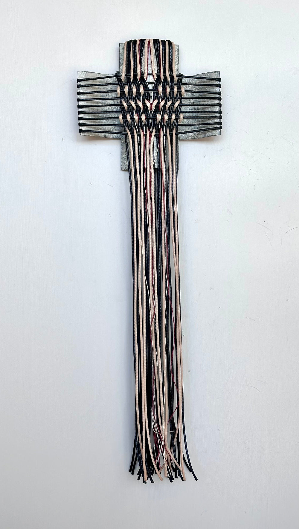 Aotearoa - Heritage River VIII, Gilly Sheffield, wall hanging made from iron rescued from Northland, woven with waxed cord, mercerised thread and fishing line.
