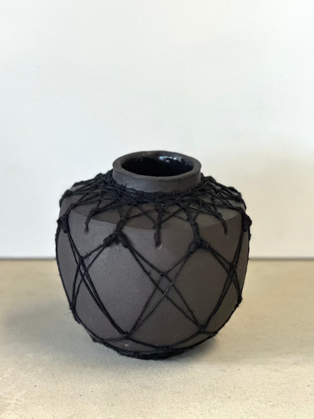 Raven, Michelle Huizinga, Ceramic vessel with woven hemp