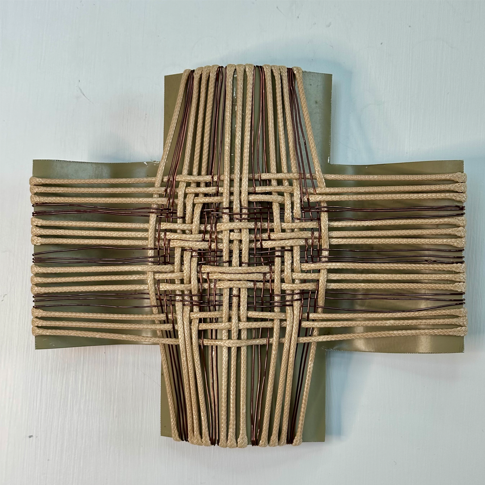 Gilly Sheffield | All That Glitters - Fault Lines | Rescued corrugated iron from Lake Hāwea, woven with waxed cord and old washing line wire | Shift into Neutral Exhibition | Turua Gallery