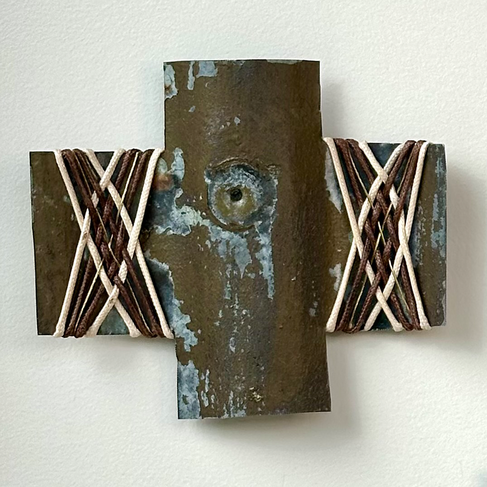 Down to Earth 1 | Gilly Sheffield | Rescued corrugated iron from Wānaka, woven with waxed cord and found picture framing wire | Shift into Neutral Exhibition | Turua Gallery