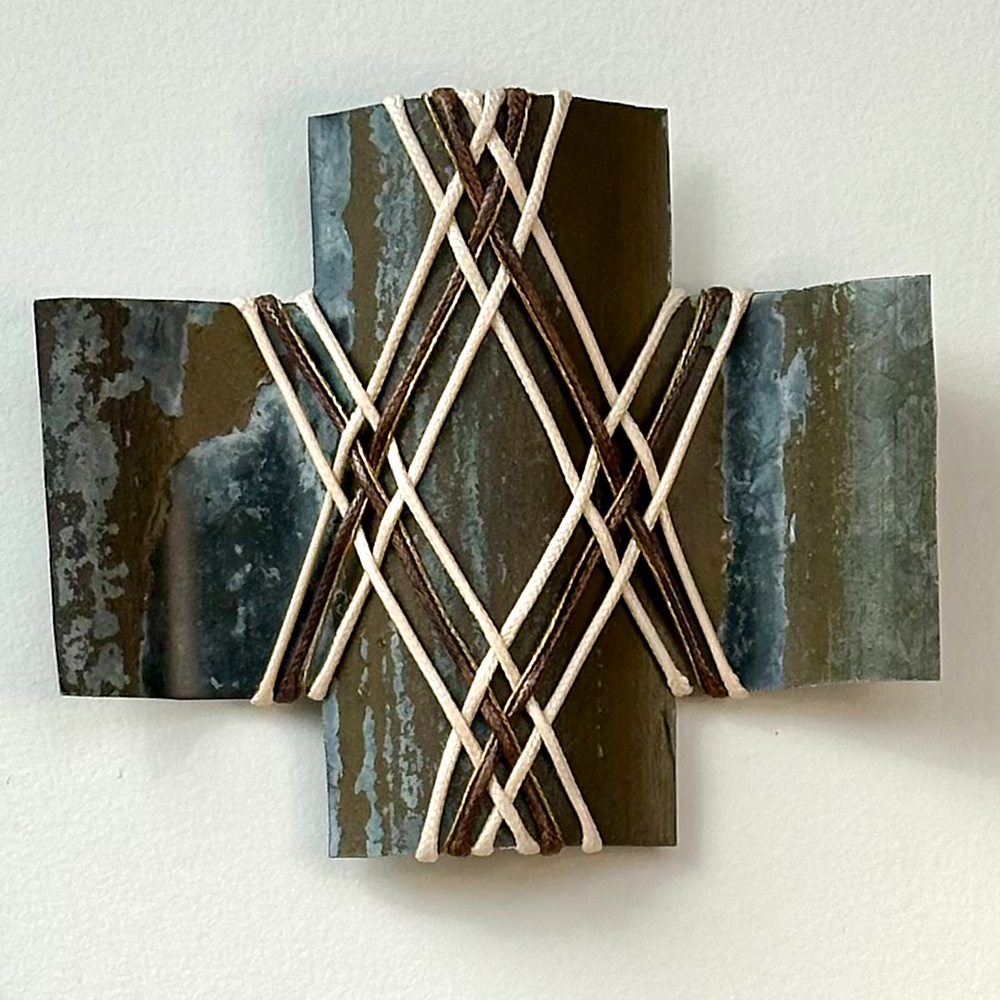 Gilly Sheffield | Kia Kaha | Rescued corrugated iron from Wānaka, woven with waxed cord and found picture framing wire | Shift into Neutral Exhibition | Turua Gallery