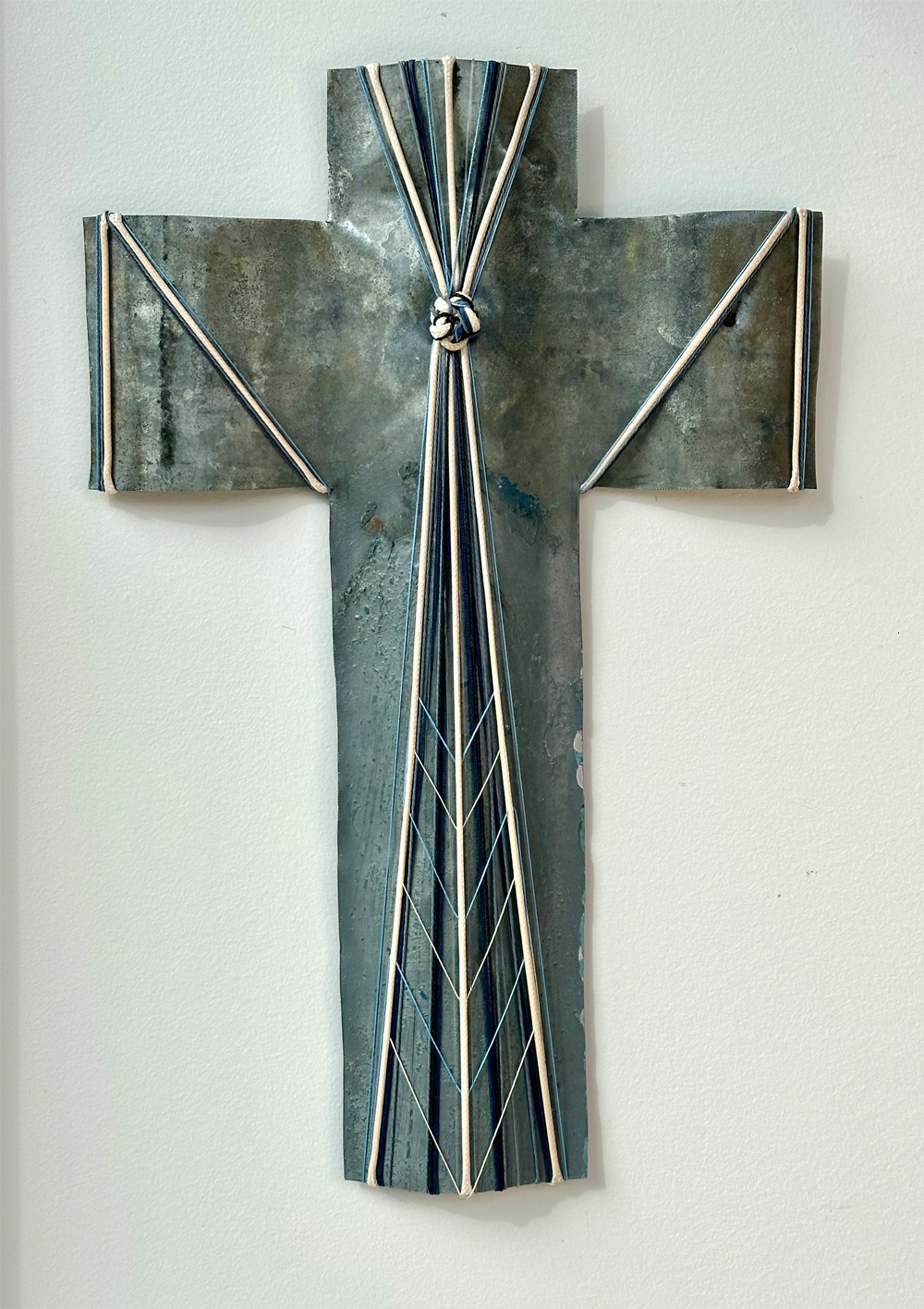 The Matriarch | Gilly Sheffield | Rescued corrugated iron from Tāmaki Makaurau Auckland, waxed cord, mercerised thread, fishing line and preloved fishing hooks | Shift into Neutral Exhibition | Turua Gallery 