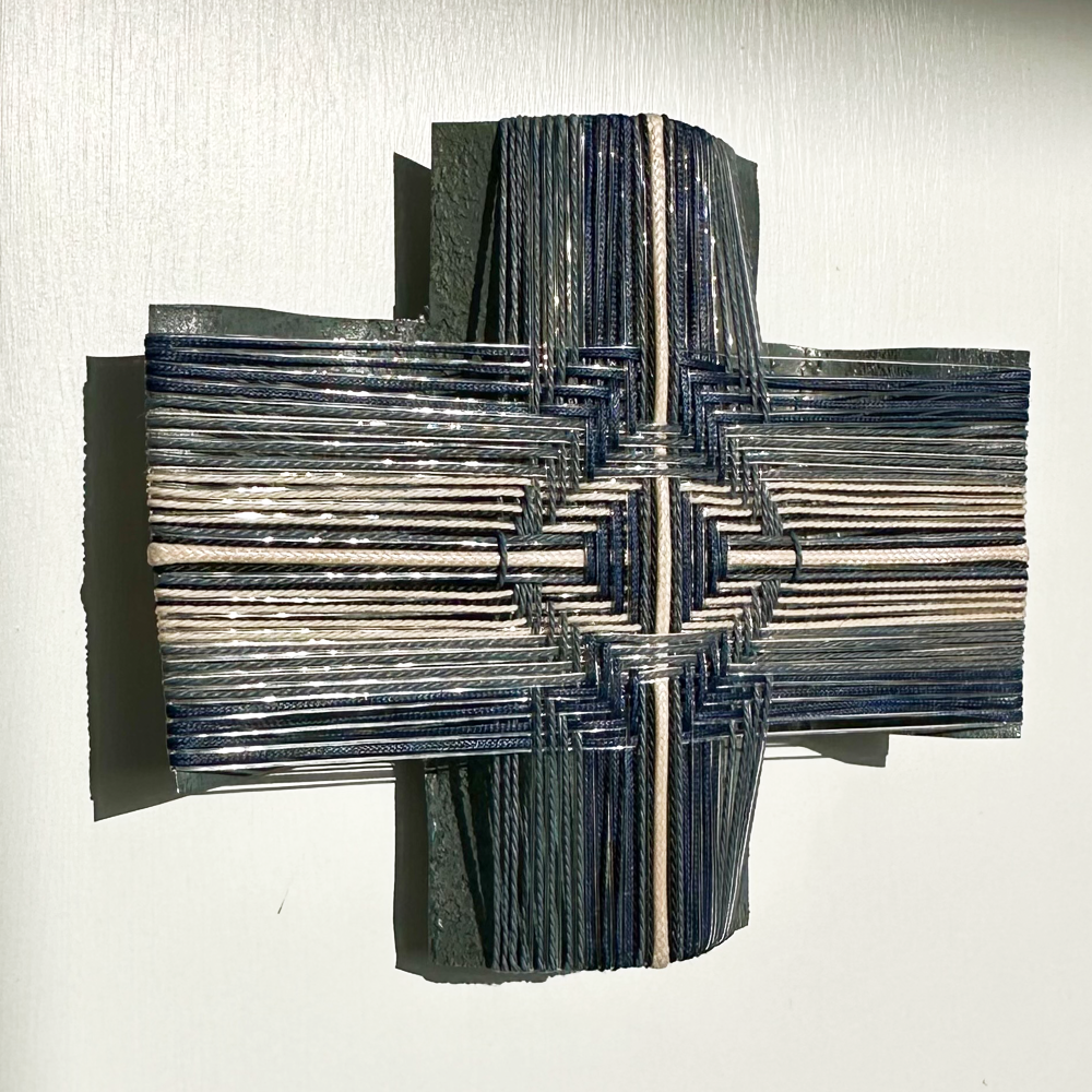 Ironsand Village - It Takes A Village Corrugated iron sculpture with thread Gilly Sheffield