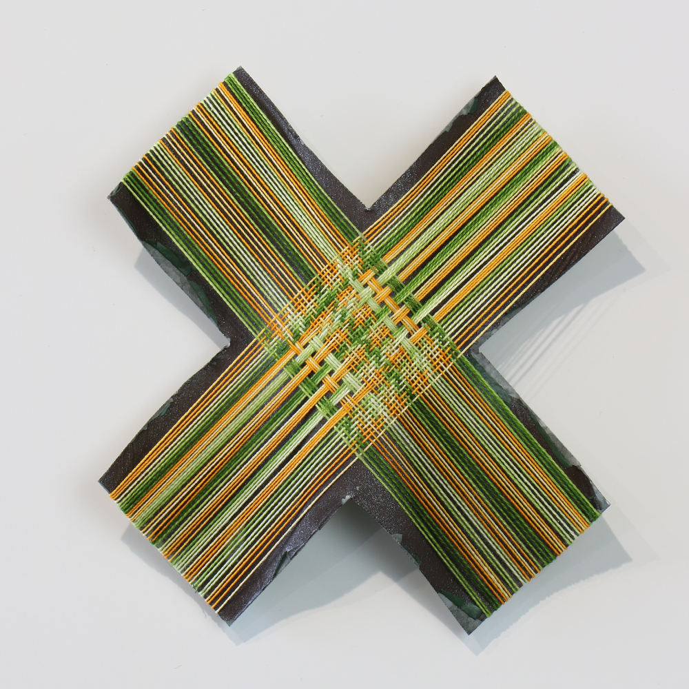 Seasons Cross I corruagted iron sculpture with thread by Gilly Sheffield