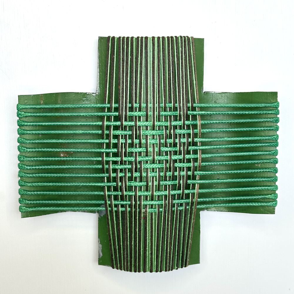 Weave me in Green VI, Iron rescued from Lake Hāwea, Central Otago and woven with waxed cord and mercerised thread, Gilly Sheffield, wall sculpture