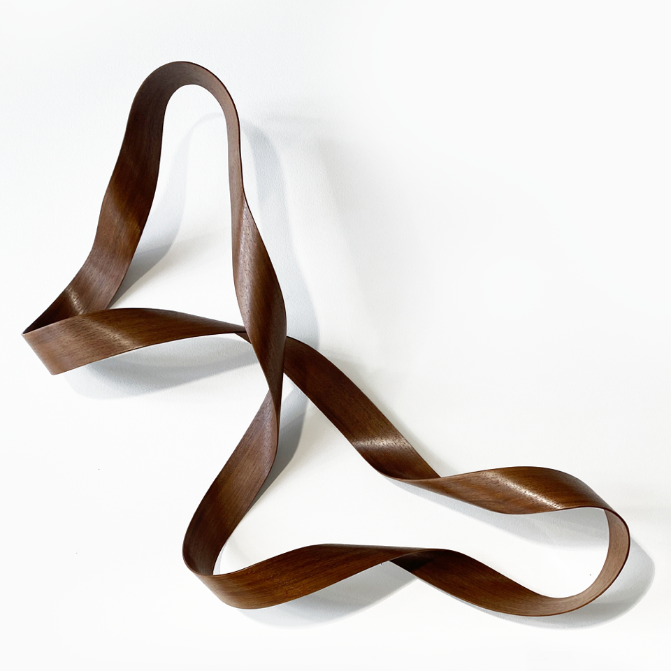 Walnut Mobius Steam bent timber wall sculpture. Jamie Adamson